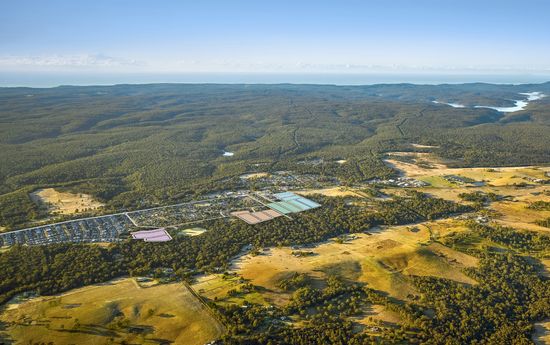 An aerial image of Appin, with Stages 1, 2, 3 & 4 of Appin Grove highlighted. Appin Public School and Appin Village are indicated, with Appin Road labelled running through the area. The nearby Dharawal National Park is also marked, with Thirroul Beach in the distance indicated along with an arrow showing the direction to nearby Wollongong.